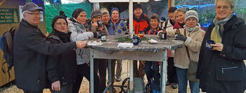 Wandergruppe auf dem Weihnachtsmarkt in Visbeck